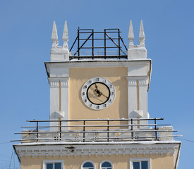 clock on the tower of the building