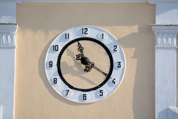 clock on the wall of a building