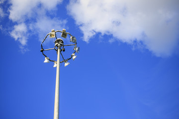 faulty spotlights. tower with searchlights on which an incomplete set of lamps