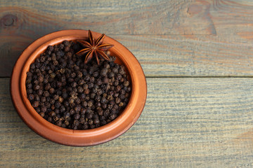 coffee with star anise on wooden background