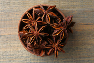 coffee with star anise on wooden background