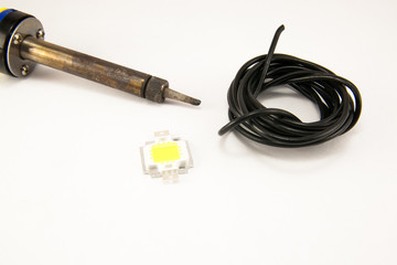 Soldering iron over white background