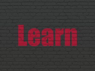 Obraz premium Education concept: Learn on wall background