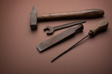 old tools on the brown background