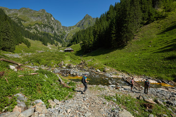 Fototapeta na wymiar Group of hikers on a mountain trail