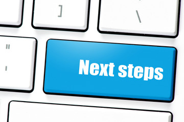 Computer white keyboard with next steps. Computer white keyboard