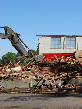 demolished building with debris and rubble