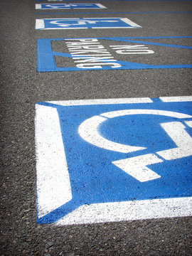 handicap and no parking warning on parking lot asphalt