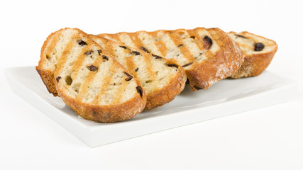 Toasted Kalamata Bread - Crusty black olive bread sliced and grilled.
