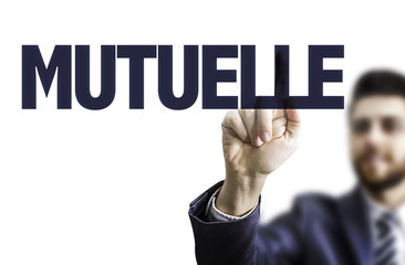 Business man pointing the text: Mutual (in French)