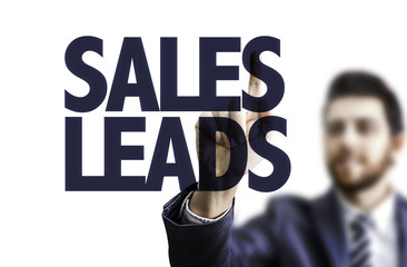 Business man pointing the text: Sales Leads