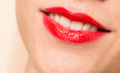 Fototapeta premium beautiful smile with red lips
