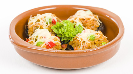 Stuffed Mushrooms - Mushrooms topped with cooked spicy rice and cheese.
