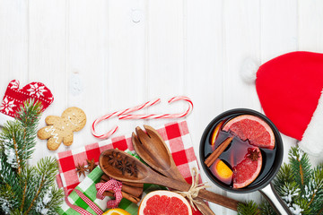 Christmas mulled wine on wooden table