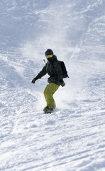 Fototapeta na wymiar man snowboarding in the snow