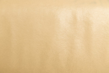 Closeup on cracked leather texture background.