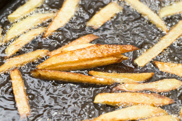 French fries fried in a pan