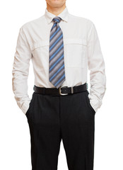 Businessman with hands in pockets