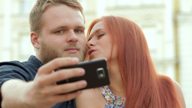 Couple photographing a selfie
