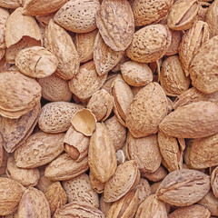 organic almonds close up, vegetarian food background