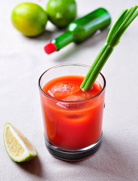 Bloody Mary cocktail with celery, Tabasco, pepper, sea salt and Worcestershire sauce