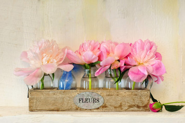 Flower composition with pink peonies / Beautiful tender flower arrangement for an event, party or wedding 