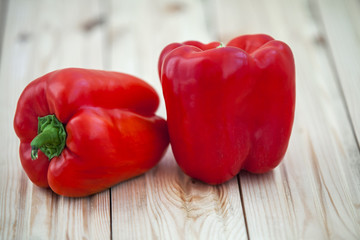 peppers on wooden table