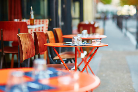Table of traditional outdoor French cafe in Paris Stock Photo | Adobe Stock