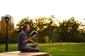 Guy reading book