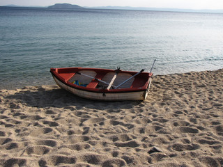 boat on the beach in summer. Greece, Sithonia