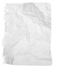 A sheet of wrinkled paper torn from a spiral notebook. Paper was crumpled and unfolded. Isolated on white.