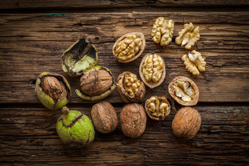 Walnuts on rustic wooden table