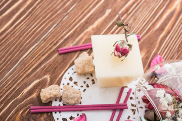 spa stuff on wooden background: candle, aroma