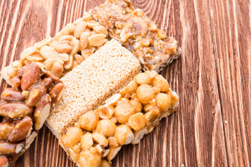 Peanut brittle sweet hard on wooden table