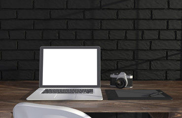 3D illustration laptopand work stuff on table near brick wall