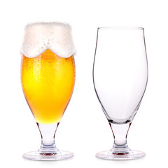 Frosty glass of light beer and empty one