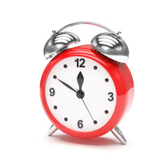 red alarm clock on white