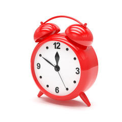 red alarm clock on white