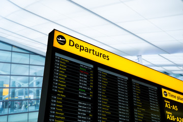 Fototapeta premium Flight information, arrival, departure at the airport, London, UK