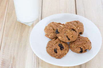Delicious raisin cookies and a glass of milk