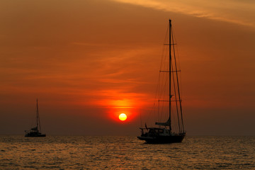 Beautiful Sunset and local fishing boats on sea at Lipe island ,Andaman sea, Satun, Thailand