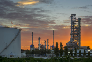 Silhouette of petrochemical plant or Oil and gas refinery in sunrise
