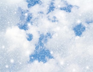 Snow on blue sky background with