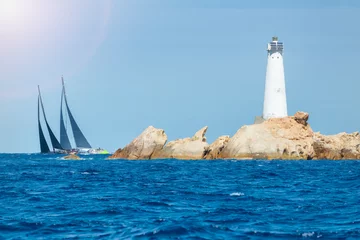 Abwaschbare Fototapete sailing in Sardinia, Monaci island lighthouse, Italy © Federico Rostagno