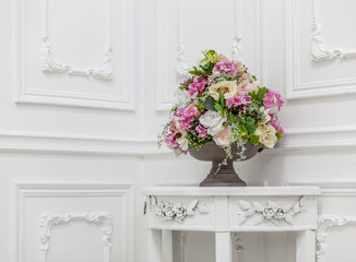 Fototapeta na wymiar Bouquet of in white interior, horizontal photo