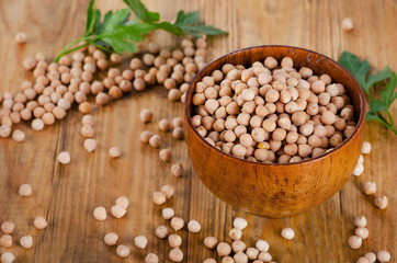 Chickpeas in wooden bowl.