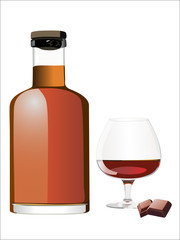 Glass of rum and bottle