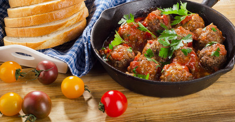 Homemade Meatballs with  Sauce and herbs.
