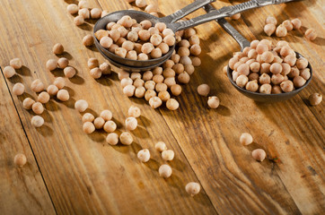 Chickpeas on a wooden background.