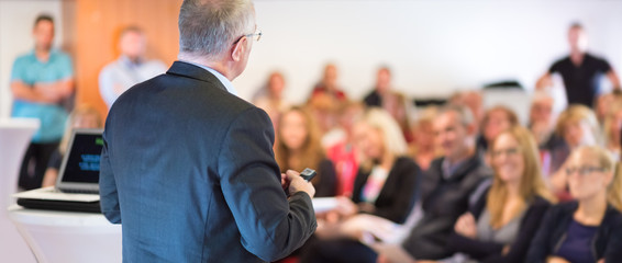 Speaker at Business Conference and Presentation.